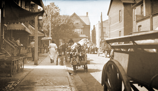Street scene with car 1910-1920s
